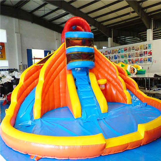 Inflatable pool slide with climbing wall