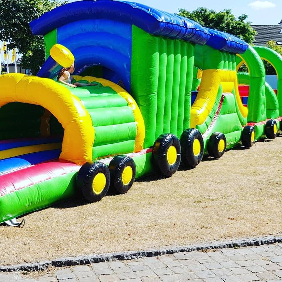 Inflatable green train obstacle course